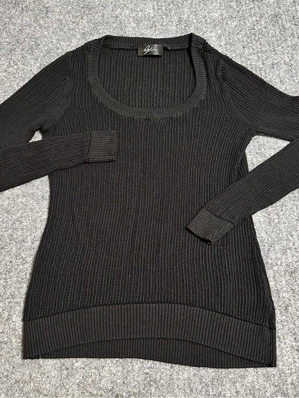 Cyrus Ribbed Knit Scoop Neck Pullover Sweater in black.